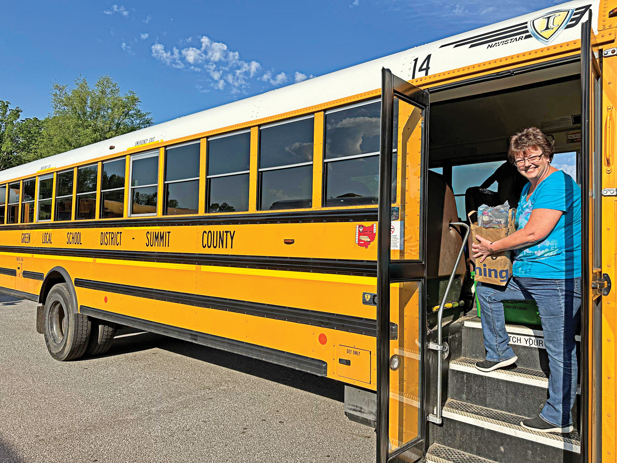 Green Schools ‘Stuff the Bus’ for Blessings in a Backpack