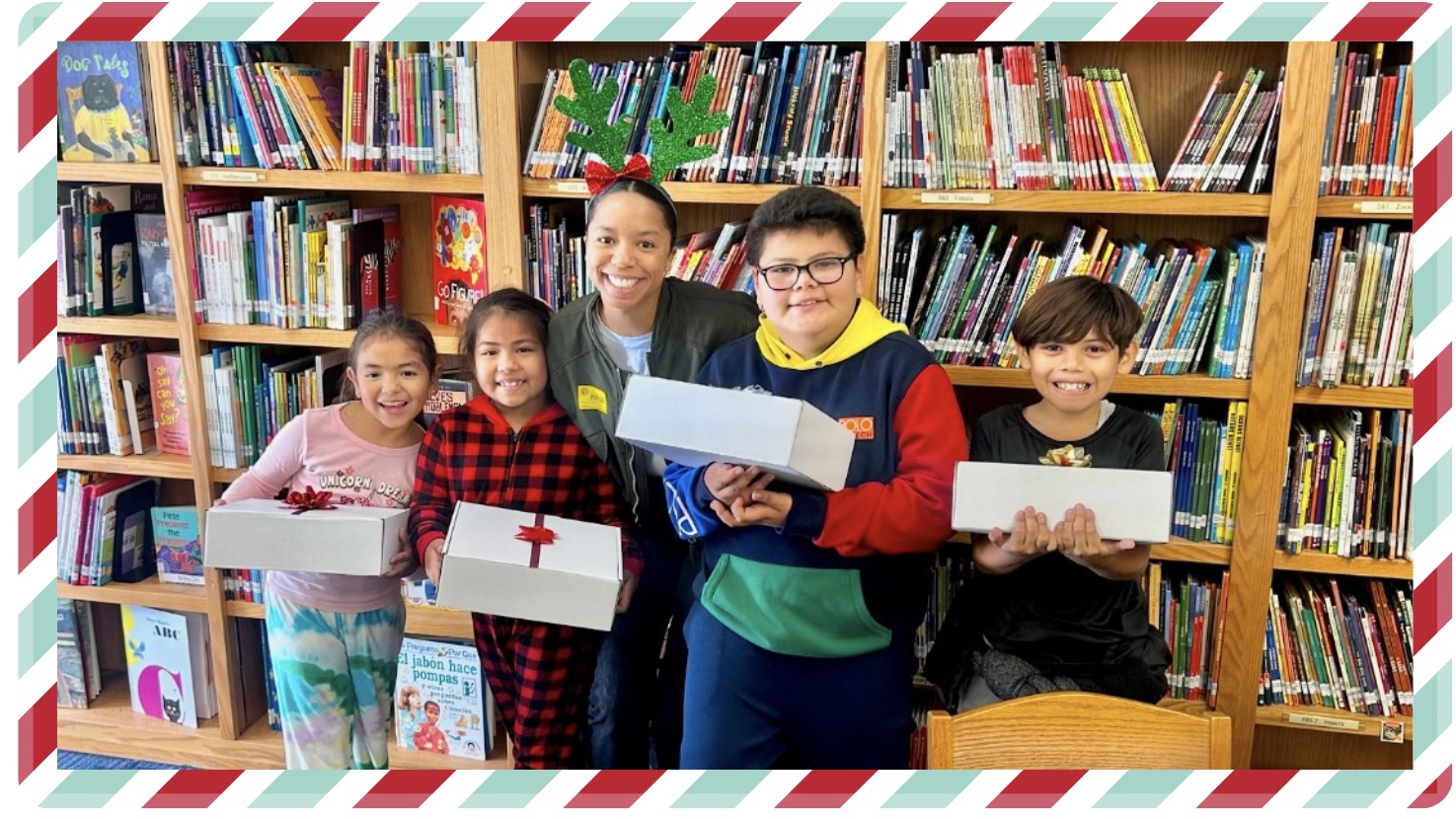 Kids holding holiday gifts